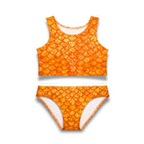 Warme oranje bikiniset Melody met schubbenpatroon, perfect voor zeemeerminnenlook en zwemfeestjes.